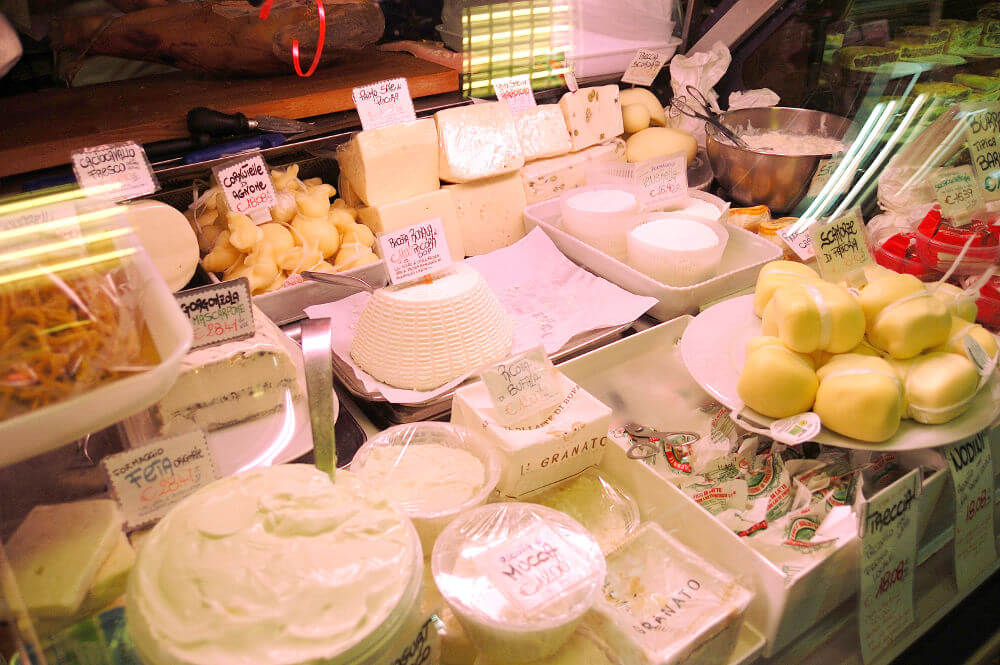 The cheese counter of a deli in Rome