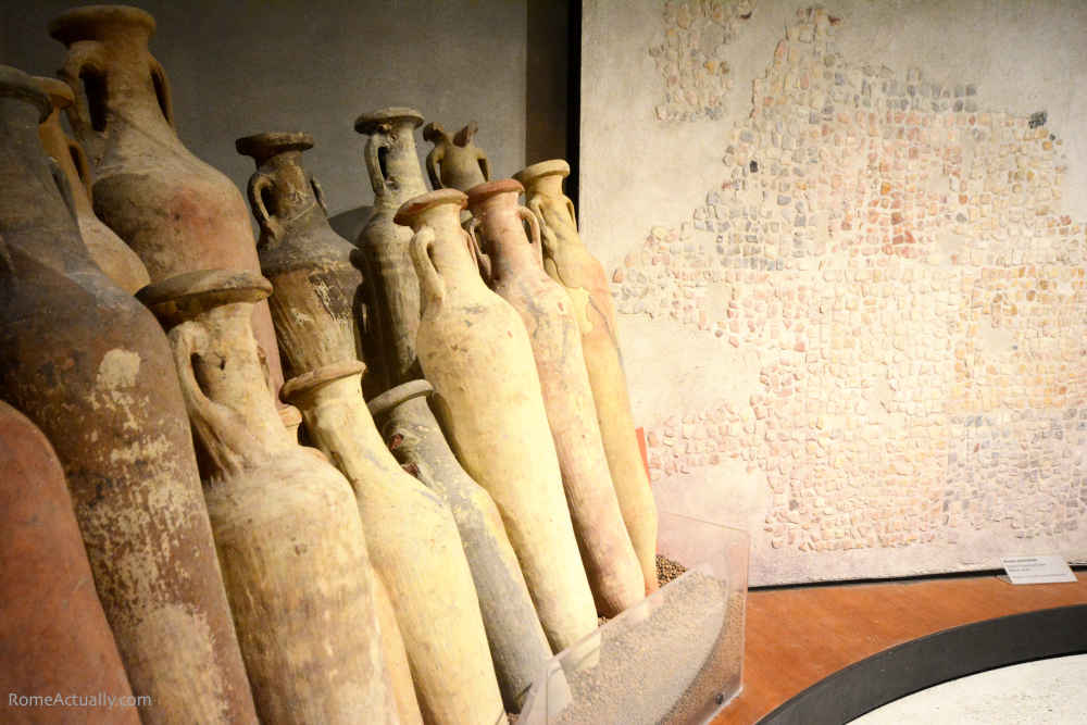 Image: Amphorae and mosaics in the exhibition area in Vicus Caprarius archaeological site