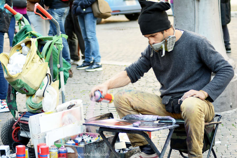 Image: Street artist in Piazza Navona, Rome. Photo by Rome Actually